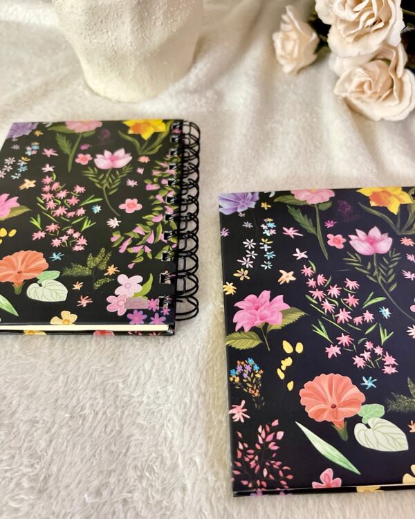 Wildflowers on black Notepad