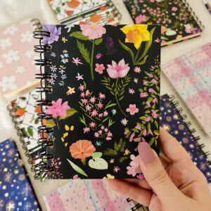 Wildflowers on black Notepad