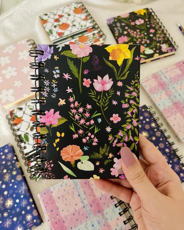 Wildflowers on black Notepad