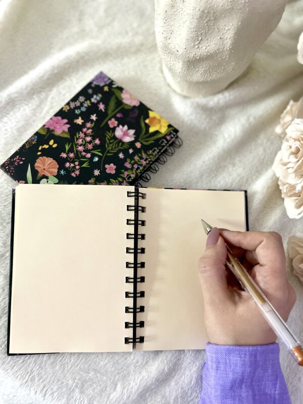 Wildflowers on black Notepad