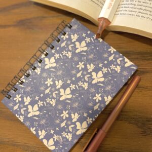 Hibiscus flower on blue Notepad